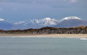 West beach Berneray with the snow covered hills of Harris behind.